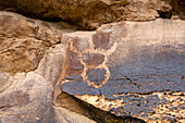 A pre-Hispanic Native American Fremont Culture rock art petroglyph panel by the Rasmussen Cave in Nine Mile Canyon, Utah.