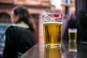 A close up of a cold beer served in a classic Cordoba tavern. Captures the essence of Spanish social culture and casual relaxation.