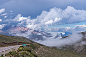 Low clouds in the mountains of the Cuesta de Lipan between Purmamarca and Salinas Grande, Argentina.