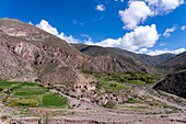 Farm fields in the eroded canyon of the Cuesta de Lipan between Purmamarca & Salinas Grande in Argentina.