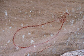 A pre-Hispanic Native American Fremont Culture rock art pictograph panel in Rasmussen Cave in Nine Mile Canyon, Utah. Depicted is an elk.