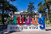 A sign for Jujuy in Plaza Belgrano in front of the Jujuy Government Palace in San Salvador de Jujuy, Argentina.