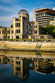 Hiroshima Peace Memorial (Genbaku Dome, Atomic Bomb Dome or A-Bomb Dome) and Motoyasu River in Hiroshima, Japan