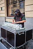 Petr Spatina, Glass Harpist, plays in the streets of Prague