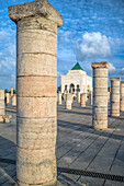 The Mausoleum of Mohammed V stands majestically among ancient columns in Rabat, showcasing unique architectural beauty and historical significance.