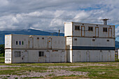 Industrial buildings made from shipping containers stacked in an industrial park in Palapá, Argentina. The containers are used as temporary buildings at construction sites.