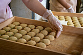 Making the traditional Daifuku in Nakatanidou shop, made of soft rice cake (mochi) fill with sweet bean paste, in Nara Japan.