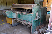 The second wool cleaning machine at Hilandería Warmi, a weaving mill in Palpalá, Argentina. This cleans out smaller debris left in the wall after the first cleaning.