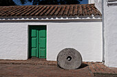 An antique stone mill wheel at the Museum of the Sugar Industry, San Miguel de Tucumán, Argentina.