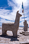 Statues of a llama & a cactus carved from salt at the Salinas Grandes salt flats on the altiplano in northwest Argentina.