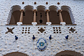 Detail of the Spanish & Moorish-style town hall or cabildo on Plaza Gomez in Humahuaca, Argentina. The capitals of the Moorish tile columns are condor heads carved of stone.