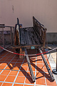 A vintage wooden cart for hauling wine barrels at the Museo de la Vid y el Vino or Museum of the Vine and the Wine in Cafayate, Argentina.