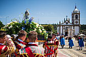 Religious procession enters São João Baptista Church during the Festival of Saint John of Sobrado, also known as Bugiada and Mouriscada de Sobrado, takes place in the form of a fight between Moors and Christians , locally known as Mourisqueiros and Bugios, Sao Joao de Sobrado, Portugal