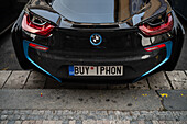 BMW car plate reads Buy IPhon, Prague