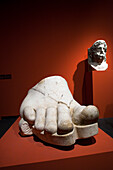 Berlin, Germany, July 24 2009, Explore the colossal marble foot from a Roman statue, showcasing ancient craftsmanship at Pergamon Museum in Berlin.