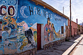 A colorful mural on a shop selling charangos in Humahuaca in the Humahuaca Valley or Quebrada de Humahuaca, Argentina.