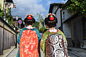 Group of women dressed as Maikos in the streets of Kyoto, Japan