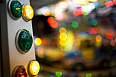 Bright lights illuminate the carousel in Sanlucar de Barrameda, capturing the festive spirit of Andalusia at night.