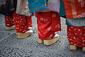 Group of women dressed as Maikos in the streets of Kyoto, Japan