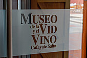 The sign on the door of the Museo de la Vid y el Vino or Museum of the VIne and the Wine in Cafayate, Argentina.