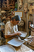 Master ceramist Manuel Cruz, known as the Gaudí of Cafayate, at work in his studio in Cafayate, Argentina.