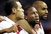 Seville, Spain, March 4 2008, Players Luis Fabiano, Keita, and Kanoute rejoice after scoring during a Champions League match in Sevillas Sánchez Pizjuán stadium.