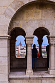 View of Parliament building, Chain Bridge and Danube River through old columns, Budapest, Hungary, Europe