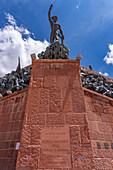 Monument to the Heros of lndependence in Humahuaca in the Humahuaca Valley or Quebrada de Humahuaca, Argentina. The single statue on the monument depicts an indigenous man.