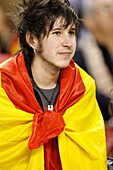 Seville, Spain, Feb 11 2009, A young supporter wrapped in a Spanish flag looks on during the friendly match between Spain and England in Sevilla.