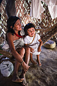 Kogi mamo (priest) and family. The Sierra Nevada de Santa Marta is home to the remnants of the Native American Tairona Culture. Koguis live in Resguardos Indigenas (Indian reserves) located in the mid-highland