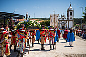 Religious procession enters São João Baptista Church during the Festival of Saint John of Sobrado, also known as Bugiada and Mouriscada de Sobrado, takes place in the form of a fight between Moors and Christians , locally known as Mourisqueiros and Bugios, Sao Joao de Sobrado, Portugal