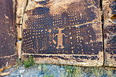 The Coyote Placing the Stars pre-Hispanic Fremont Amerindian rock art panel in Nine Mile Canyon, Utah. This panel may depict the Amerindian myth of how the coyote placed the stars in the sky.