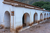 Arches of the Spanish-colonial style of the cabildo or town hall in Purmamarca, Argentina. Now housing a cultural center.