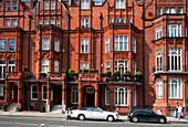 London, UK, May 3 2009, Discover a beautifully designed Victorian building in red brick located on Pont Street, Kensington, showcasing historic architecture.