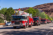 A fire department ladder truck in the Fourth of July Parade on Independence Day in Moab, Utah.