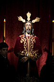 Seville, Spain, March 4 2008, The statue of Nuestro Padre Jesús ante Anás stands in a ceremonial setting during the Holy Week procession in Seville.