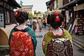 Group of women dressed as Maikos in the streets of Kyoto, Japan