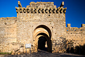 Explore the grand entrance of Parador de Carmona, a stunning former Moorish castle in Andalusia, Spain.