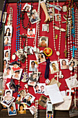 Seville, Spain, Sept 27 2008, Colorful votive offerings adorn the wall, showcasing devotion to the Lord of Great Power in Seville, reflecting heartfelt gratitude and faith.