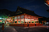 Exploring Fushimi Inari Taisha temple at night, Kyoto, Japan