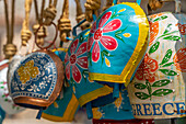 View of decorated cow bells in souvenir shop, Theologos, Thassos, Aegean Sea, Greek Islands, Greece, Europe