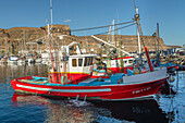 Fishing boat at the harbour of Puerto de Mogan, Gran Canaria, Canary Islands, Spain, Atlantic, Europe