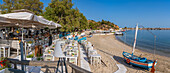 View of restaurants and cafes overlooking beach at Limenaria, Limenaria, Thassos, Aegean Sea, Greek Islands, Greece, Europe