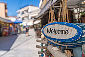 View of Welcome sign and souvenirs in Thassos Town, Thassos, Aegean Sea, Greek Islands, Greece, Europe