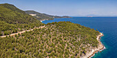 View of woodland and coastline near Chrysi Ammoudia, Thassos, Aegean Sea, Greek Islands, Greece, Europe