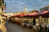 Riva del Vin street full of restaurants and tourists at sunset, Venice, UNESCO World Heritage Site, Veneto, Italy, Europe