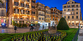 View of restaurants and bars in Pot throwing (Botides) at dusk, Corfu Town, Corfu, Ionian Sea, Greek Islands, Greece, Europe