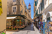 View of shops and Holy Church of Saint Spyridon, Corfu Old Town, UNESCO World Heritage Site, Corfu, The Ionian Islands, Greek Islands, Greece, Europe