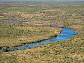 A view of the Mitchell River meandering towards Swift Bay as seen from a commercial helicopter, Kimberley, Western Australia, Australia, Pacific