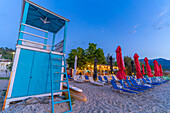 View of lifeguard tower and sun loungers on beach after sunset, Thassos Town, Thassos, Aegean Sea, Greek Islands, Greece, Europe